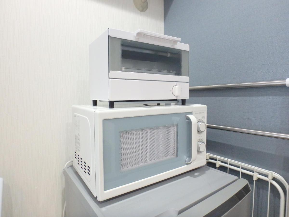 Sakurajima Building Villa Осака Екстериор снимка